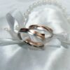 a pair of rings on a while cloth