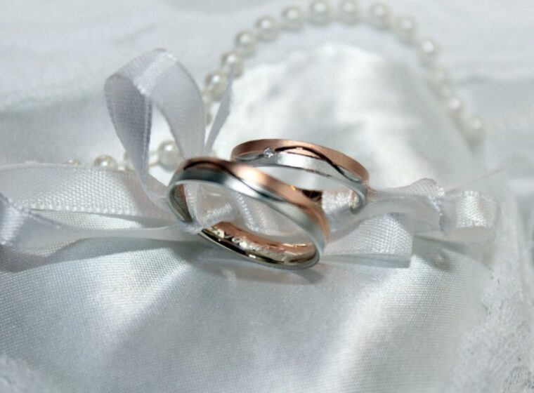 a pair of rings on a while cloth